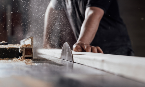 A table saw cutting lumber